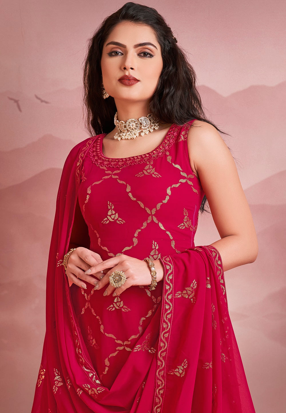 Embroidered Georgette Pakistani Suit in Fuchsia
