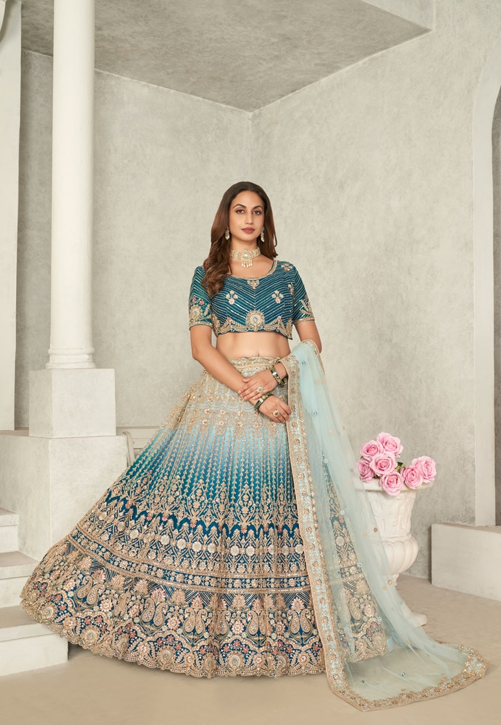 Net Embroidered Lehenga in Shaded Blue