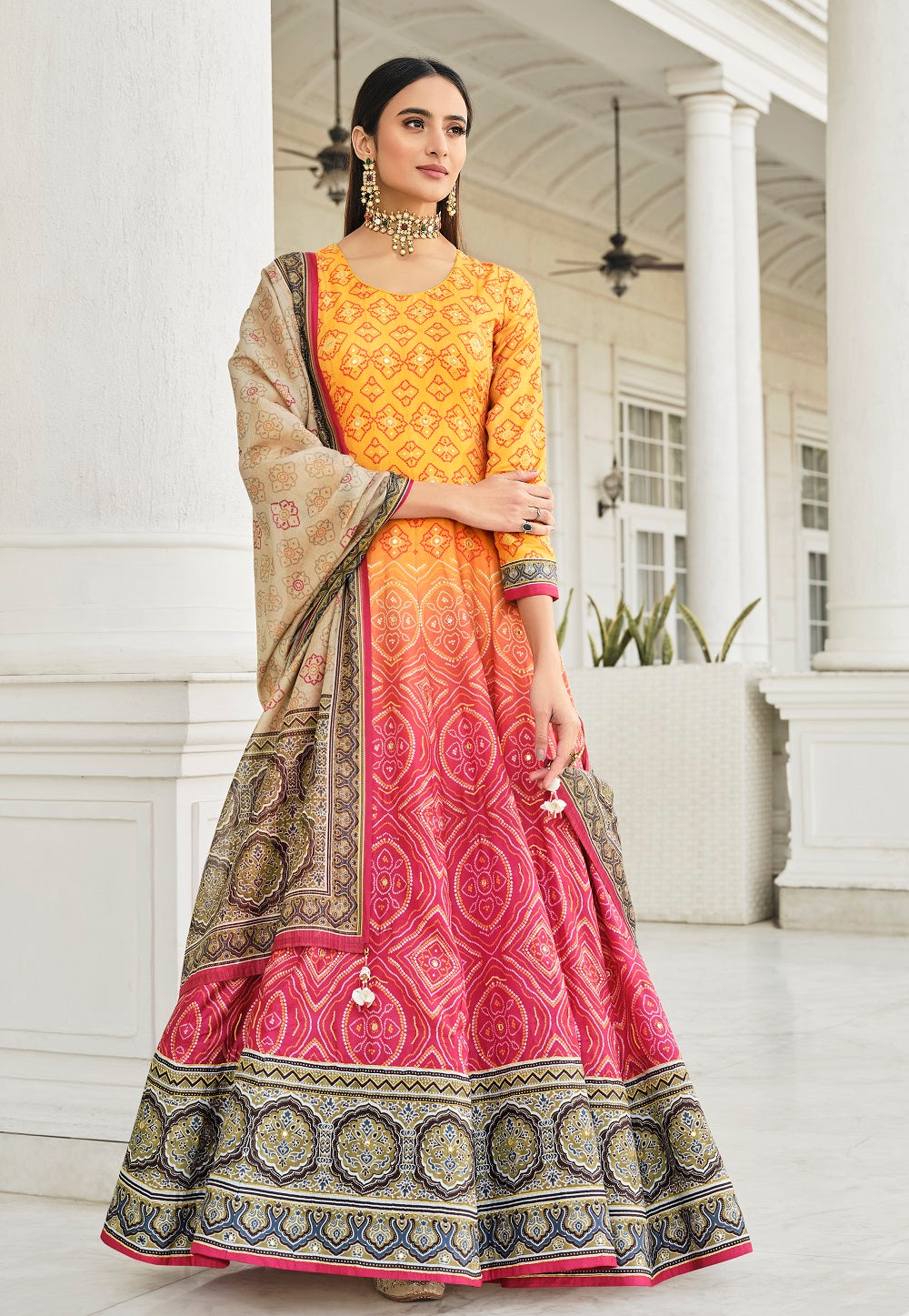 Bandhani Print Banarsi Silk Readymade Gown in Mustard & Pink