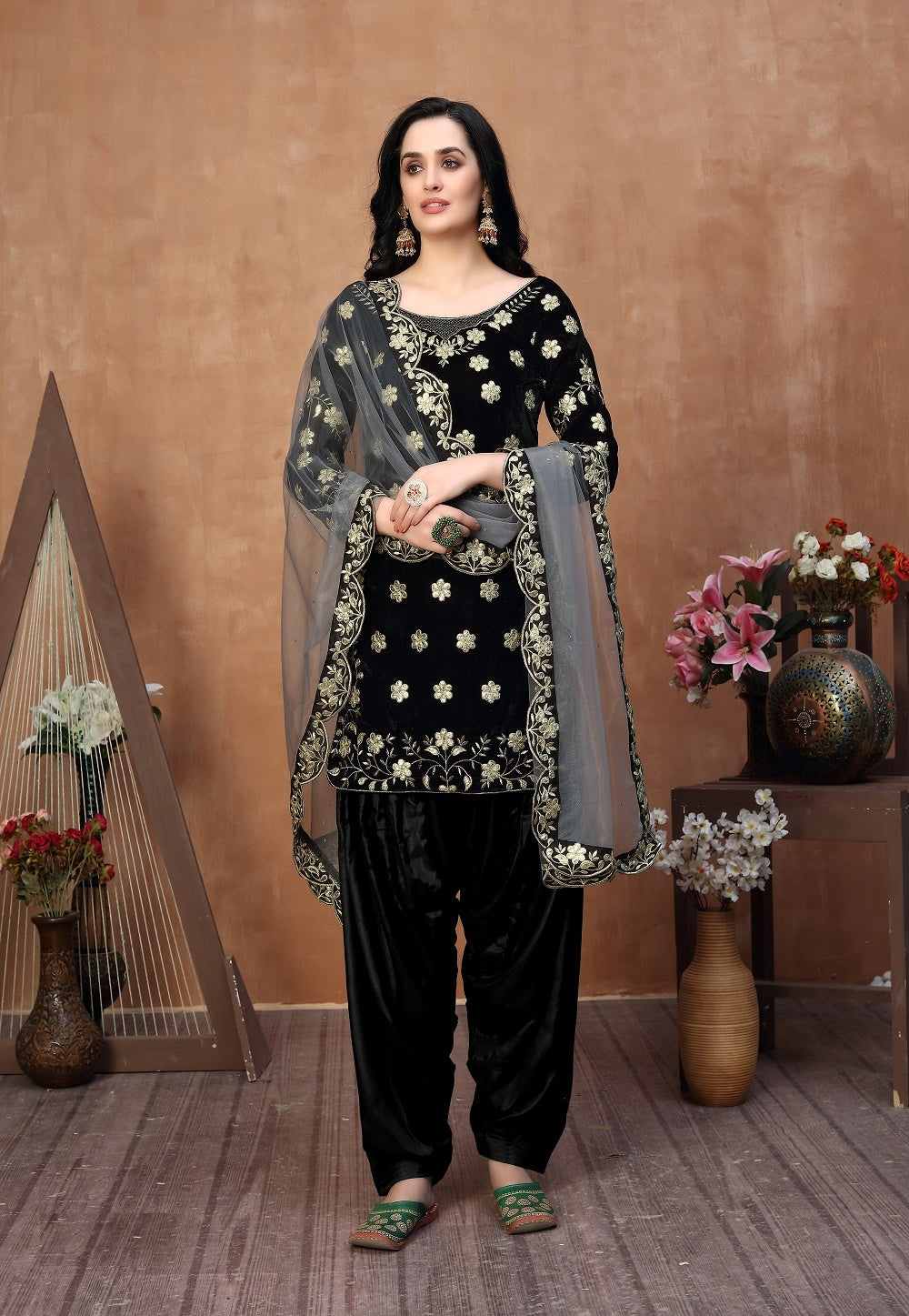 Embroidered Velvet Punjabi Suit in Black