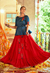 Art Silk Embroidered Peplum Top and Skirt Set in Red