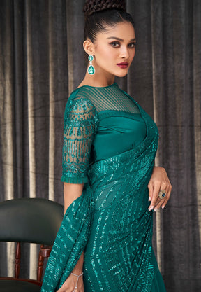 Sequinned Georgette Saree in Teal Green